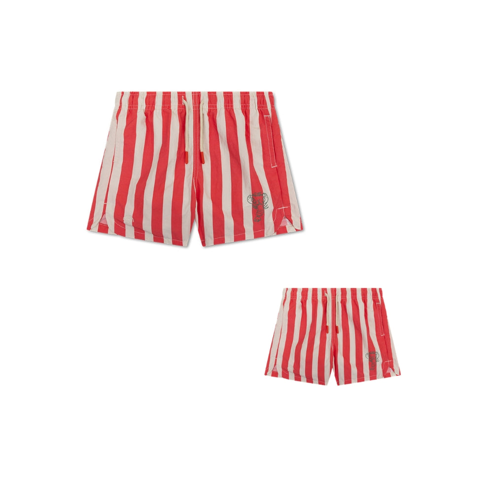 This is a set comprising a pair of men’s swim shorts and a pair of boys’ swim shorts. The swim shorts have red and white stripes on it, with a lobster in the bottom left-hand corner. The background is white.