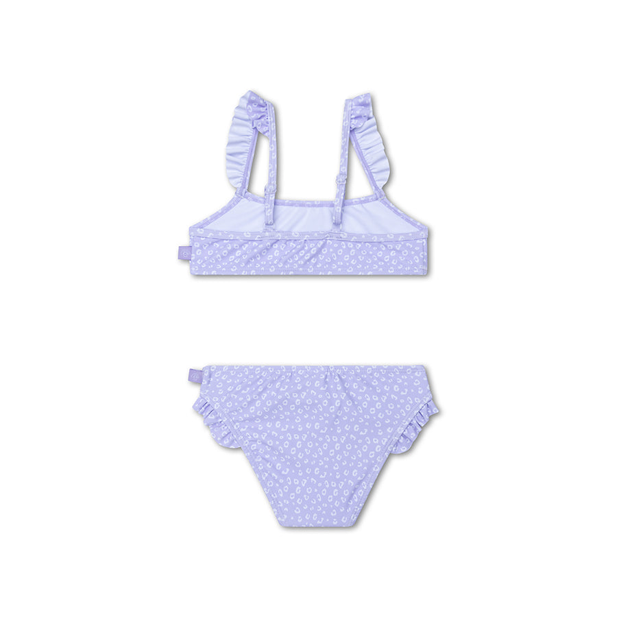 The back of a purple bikini with a leopard print on a white background