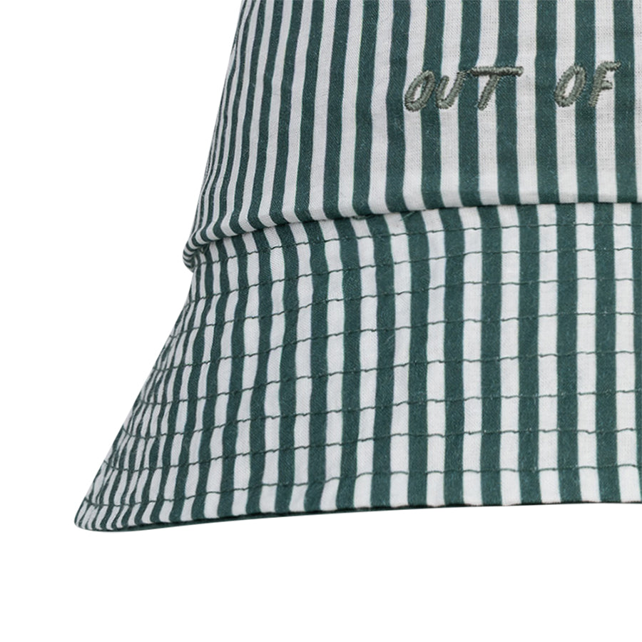 Green and white striped bucket hat with 'OUT OF' text on a white background