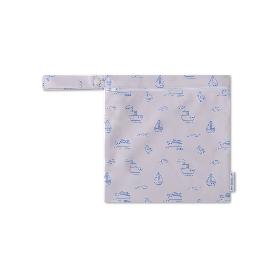 Little pouch with a boat pattern on a white background.