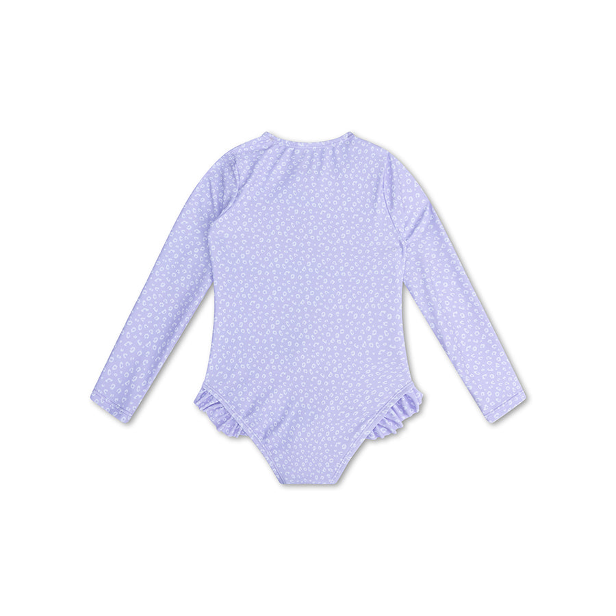 The back of a purple leopard swimsuit with long sleeves and ruffles on a white background