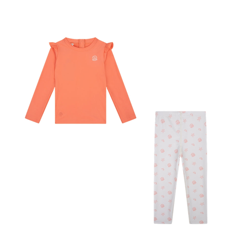 A set comprising a shirt and leggings. The top has long sleeves and is orange/salmon in colour. It features ruffles on the shoulders. There is a shell in the top right-hand corner of the top. The leggings are white and feature a shell print in orange/salmon on a white background. 
