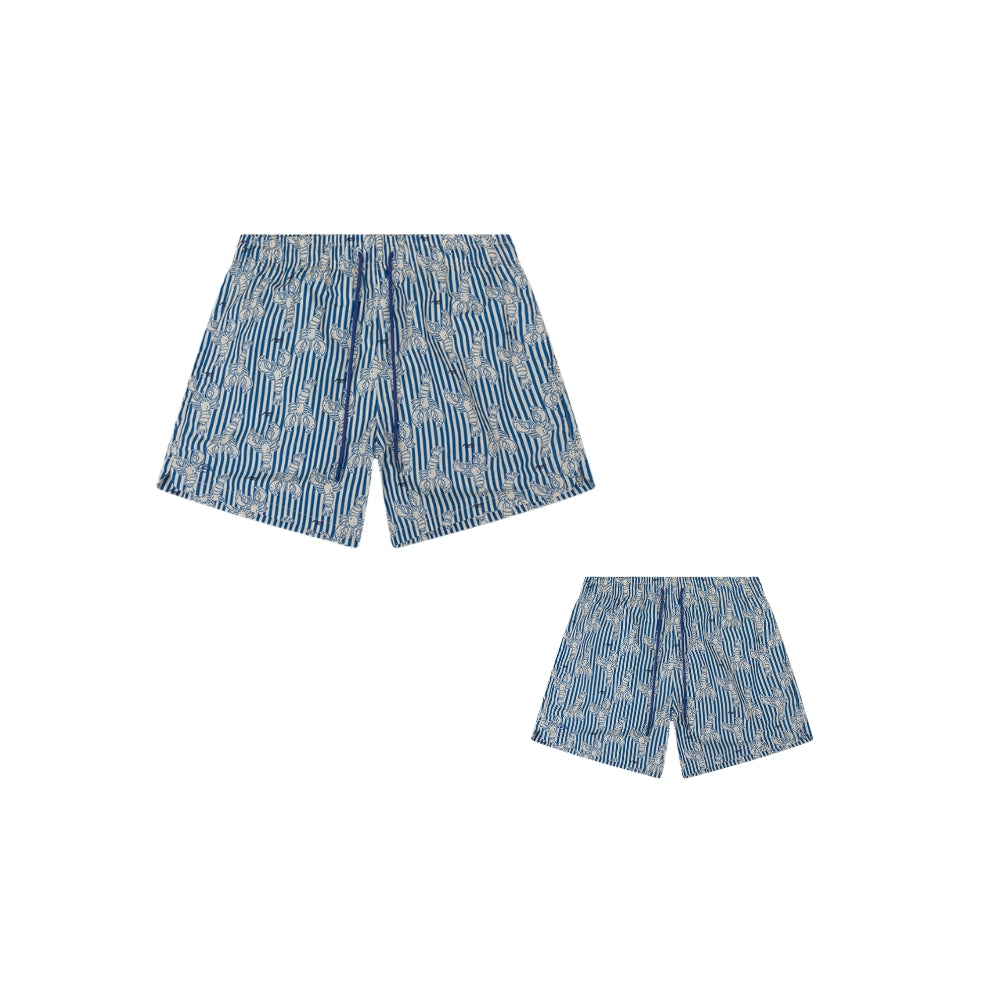 This is a set comprising a pair of men’s swim shorts and a pair of boys’ swim shorts. The swim shorts have blue and white stripes on it, with a lobster pattern. There is also a white background. 