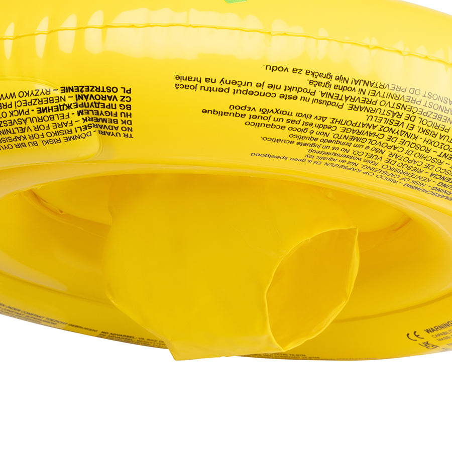 Close-up of the bottom of the yellow baby float with the warnings on it on a white background.