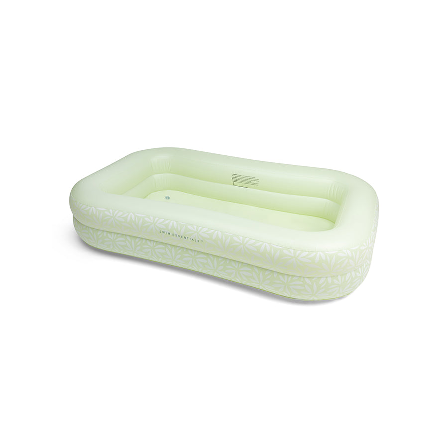 The side of the green inflatable pool with the Swim Essentials logo on a white background