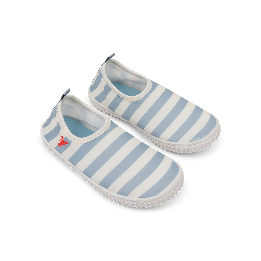 Pair of blue and white striped water shoes on a white background