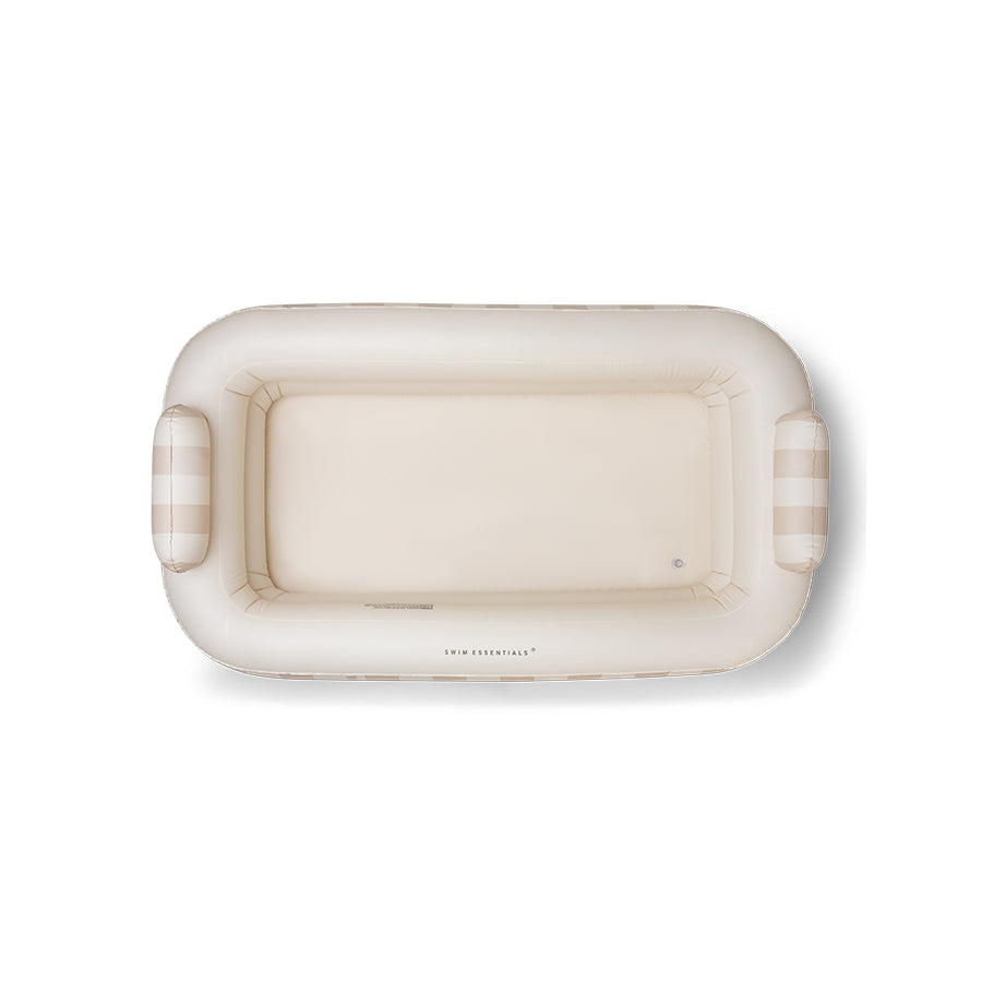 The inside of the inflatable pool with on both sides of the pool neck support on a white background.