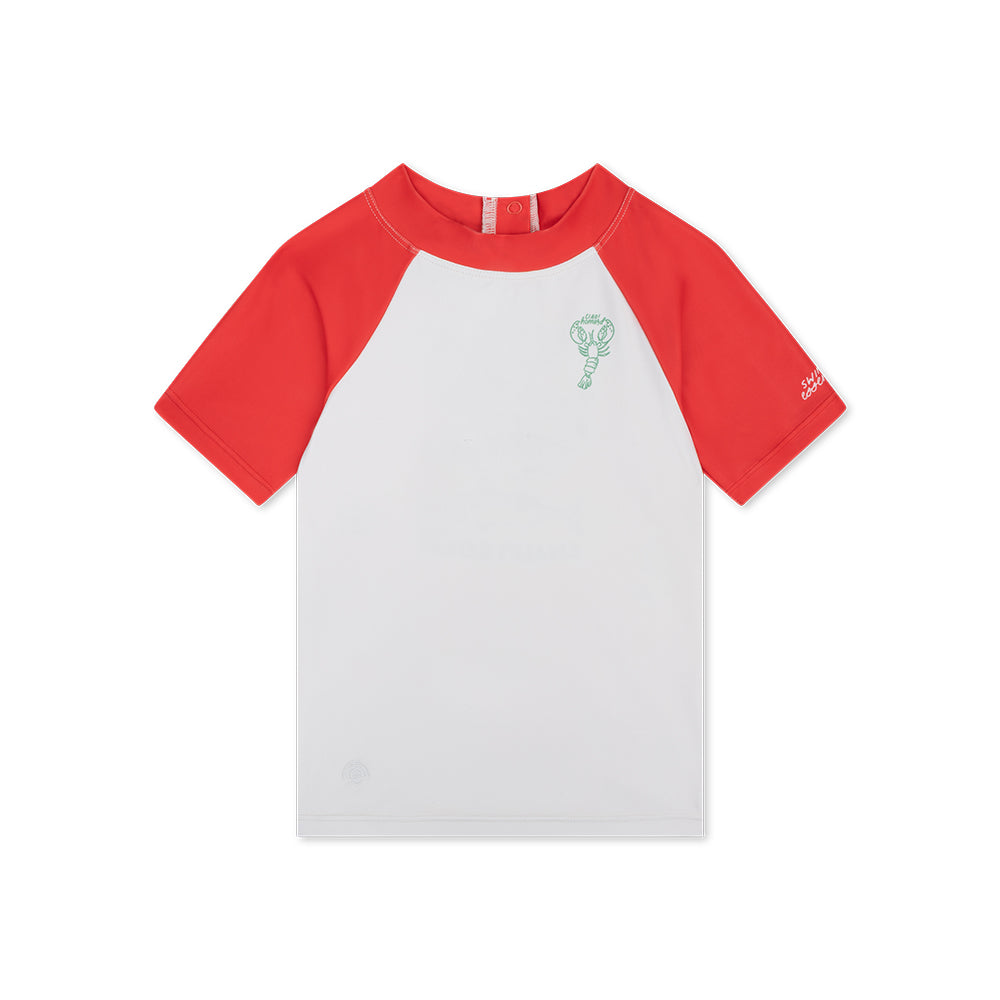 The front of a red-and-white short-sleeved swim shirt. The front is white with a green lobster in the upper right corner. The collar and short sleeves are red. On a white background. 
