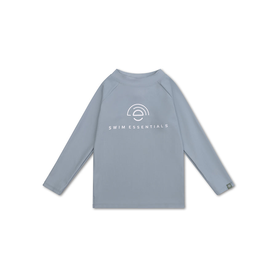 Green long-sleeve shirt with a white 'Swim Essentials' logo on a white background