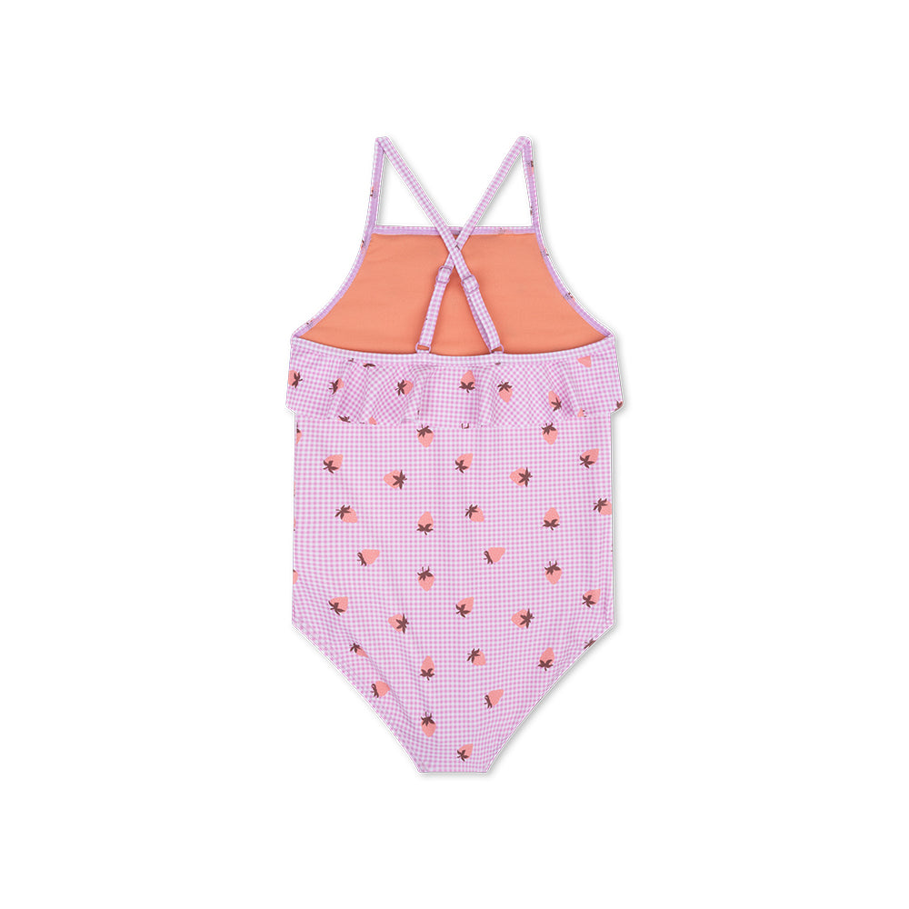 The back of a pink checkered swimsuit with a strawberry pattern on a white background