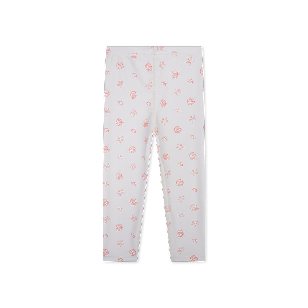 White leggings with pink sea shells and sea stars pattern on a white background.