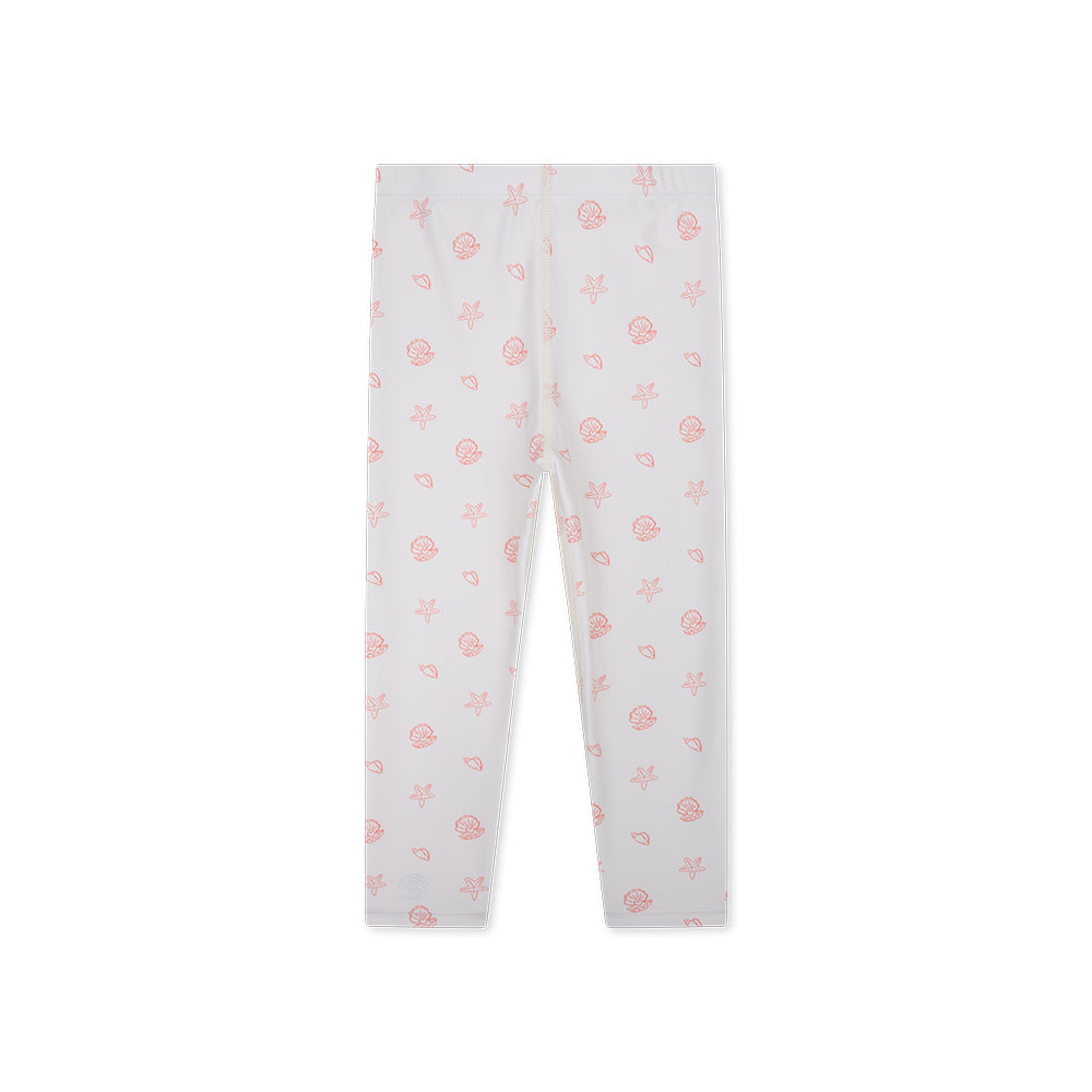 White leggings with pink sea shells and sea stars pattern on a white background.