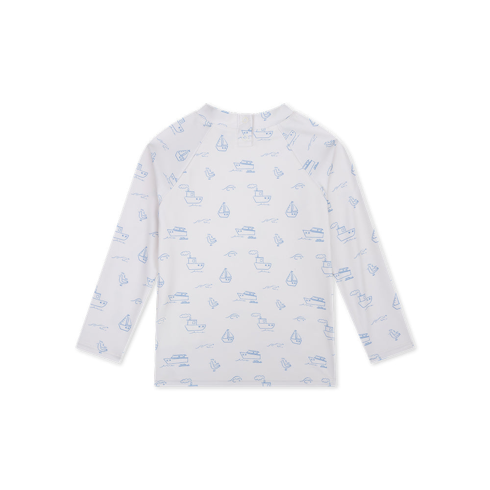 White long-sleeve shirt with blue patterns on a white background