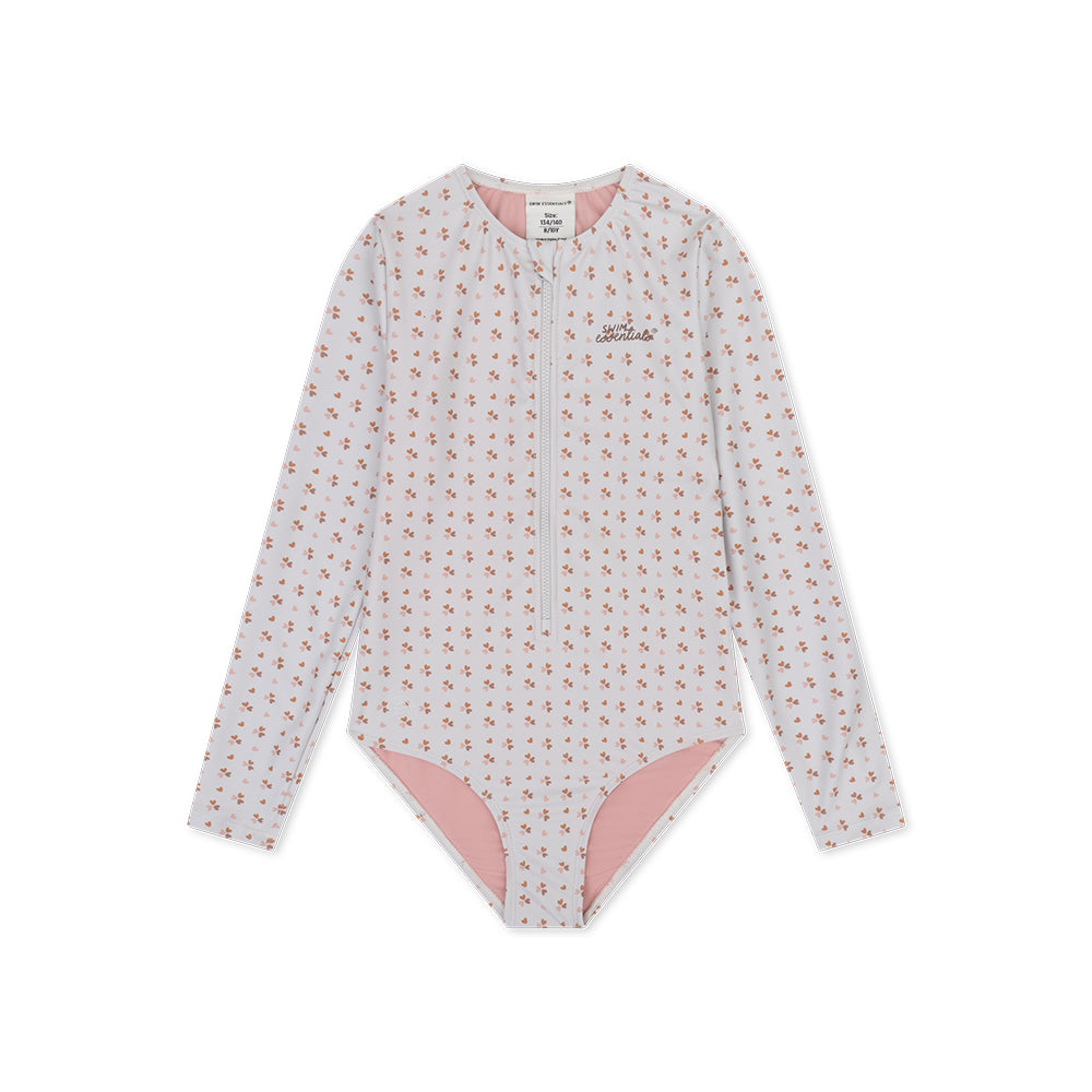 Girls long-sleeve swimsuit with old pink cozy hearts pattern, with a zip and a swim essentials logo on a white background
